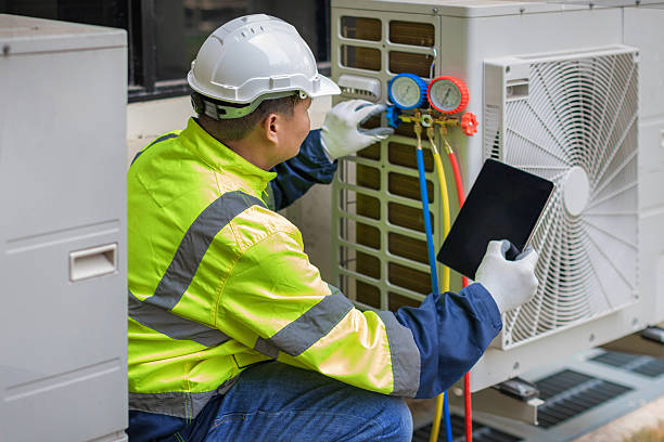 Professional Heat Pump Repair technician working in Forest City, FL